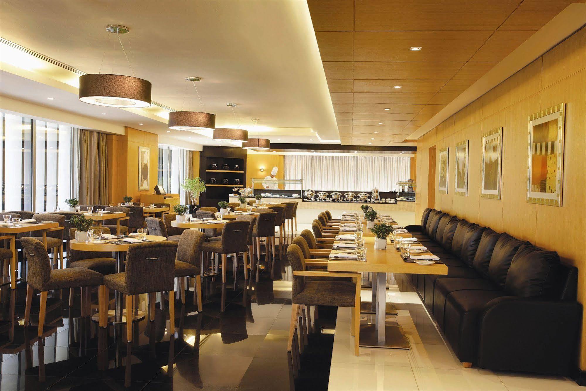 Hala Arjaan By Rotana, Deluxe Hotel Apartments Abu Dhabi Restaurant billede